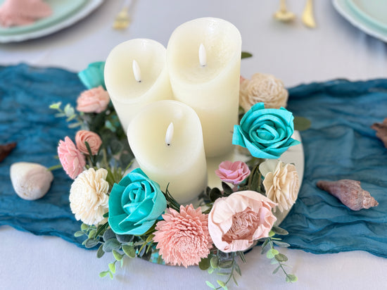 Candle ring garland with beach wedding colors of teal, blush and white