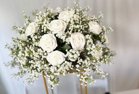 Floral dome arrangement for column stand in babies breath and white roses