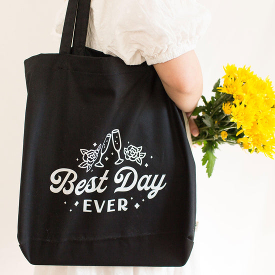 Best Day Ever! Large Canvas Bridal Tote Bag by Oaklynn Lane - Black tote girl holding it with flowers